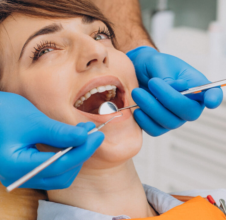 female patient sitting dentist chair making professinal hygiene 2